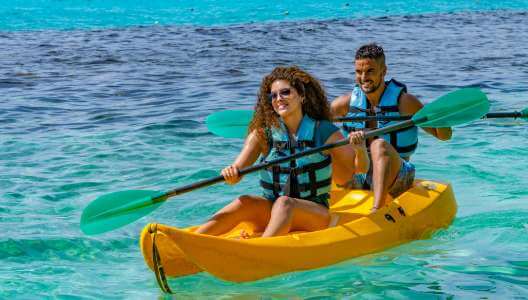 Two persons in the archaeological ruins of Punta Sur- Isla Mujeres